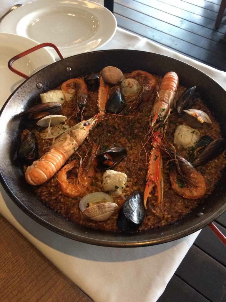 Mixed seafood paella at 1881 Per Sagardi restaurant in Barcelona