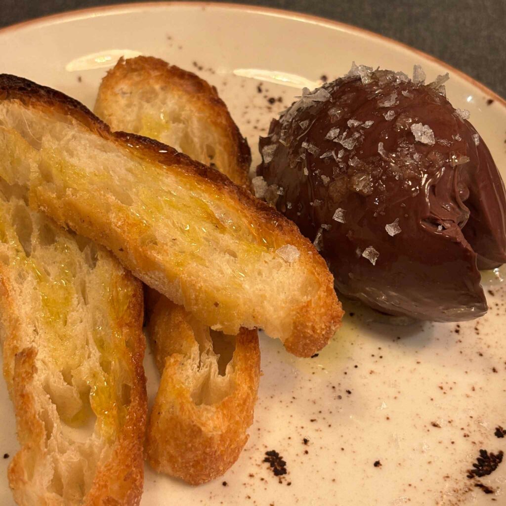 Salted chocolate with olive oil and bread at Anardi restaurant in Barcelona
