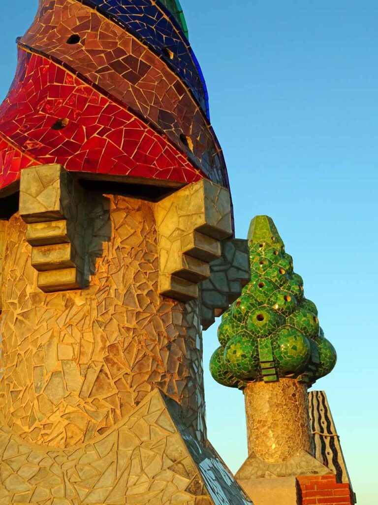 Brightly colored mosaic tiles on the chimneys on Palau Guell in Barcelona