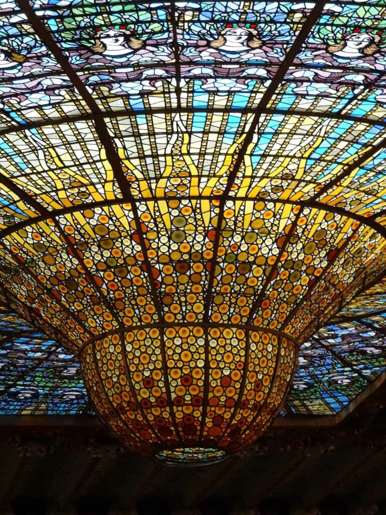 Intricate stained glass skylight at the Palau de la Musica in Barcelona